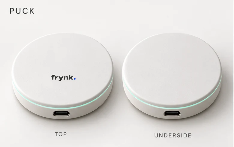 Equal-sized Puck views: centred branding on top and a plain flat underside, without contacts.
